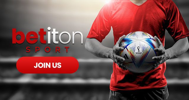 a footballer with a red jersey holding the official 2022 World Cup ball and the Betiton Sport logo with a button saying join us