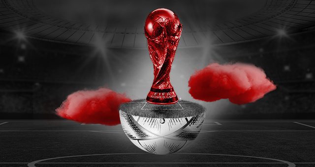 the world cup trophy floating on half a football 