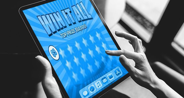 someone playing a scratchcard game on their tablet