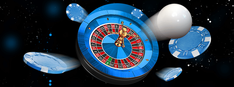 roulette wheel, ball and chips on a black background