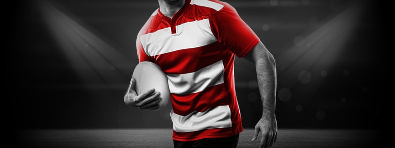 rugby player holding a ball