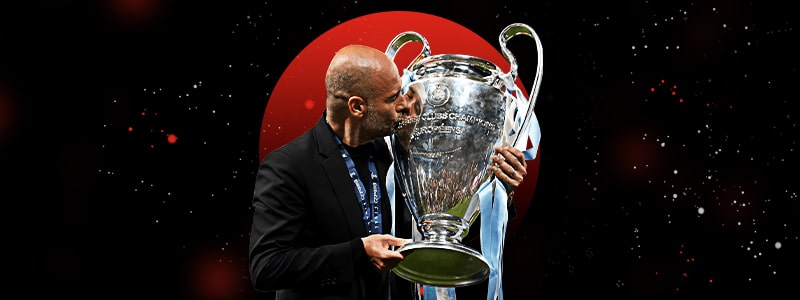 a championship winner kissing the trophy while holding it