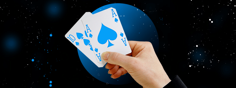 hand holding blackjack cards